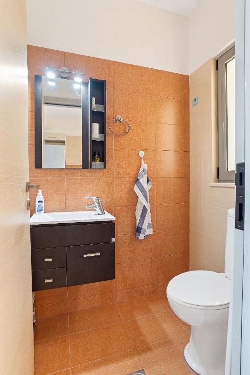 A bathroom at Almyrida Panorama view house BY APOKORONAS-VILLAS