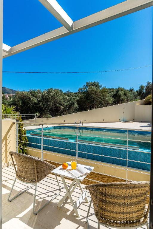 The swimming pool at or close to Almyrida Panorama view house BY APOKORONAS-VILLAS