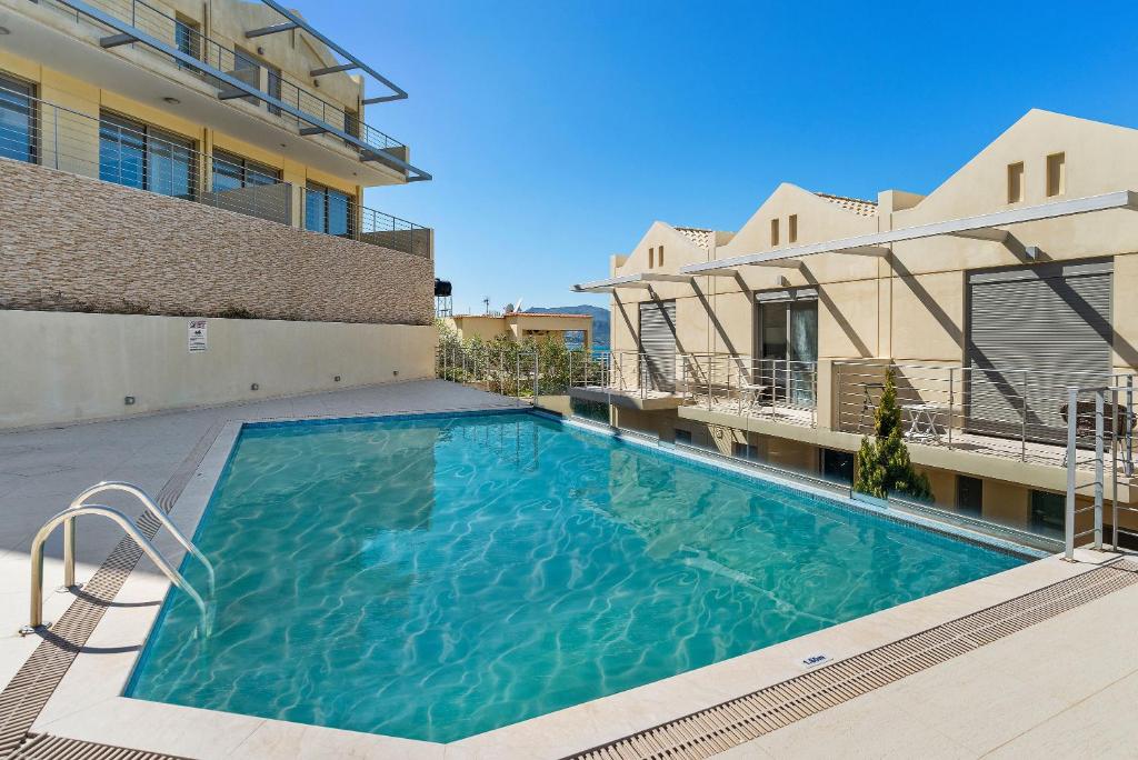 The swimming pool at or close to Almyrida Panorama view house BY APOKORONAS-VILLAS