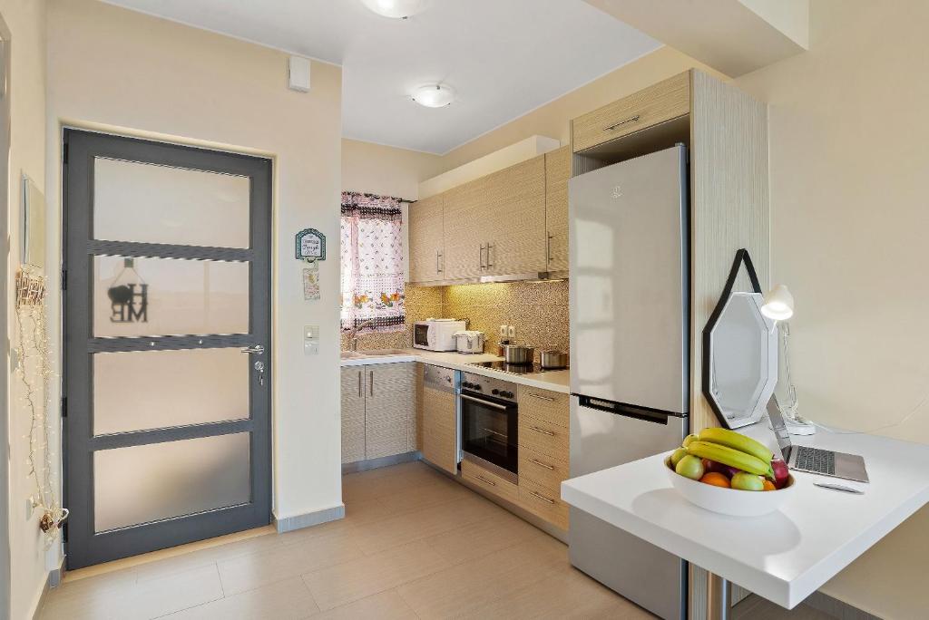 A kitchen or kitchenette at Almyrida Panorama view house BY APOKORONAS-VILLAS