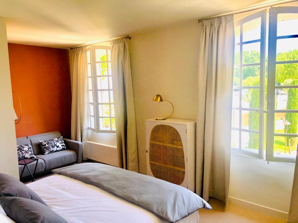 Ein Bett oder Betten in einem Zimmer der Unterkunft Villa Agrippa
