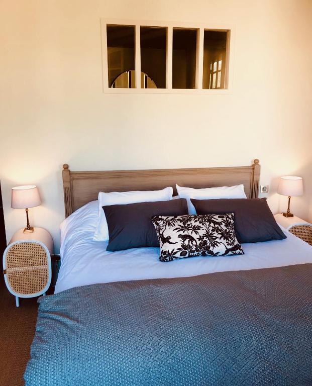 Ein Bett oder Betten in einem Zimmer der Unterkunft Villa Agrippa