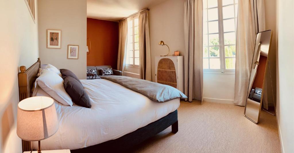Ein Bett oder Betten in einem Zimmer der Unterkunft Villa Agrippa