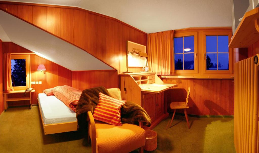 Postel nebo postele na pokoji v ubytování Hotel Arlenwald