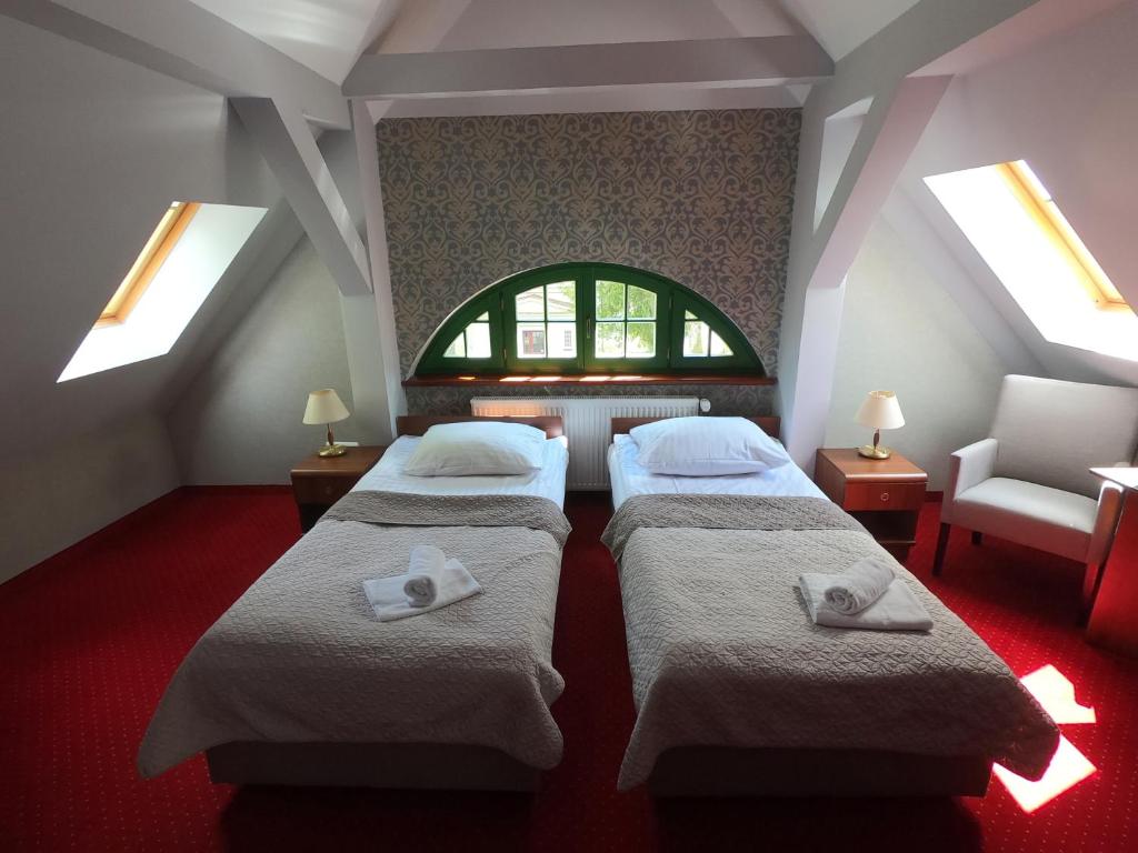 Cama o camas de una habitación en Hopferówka