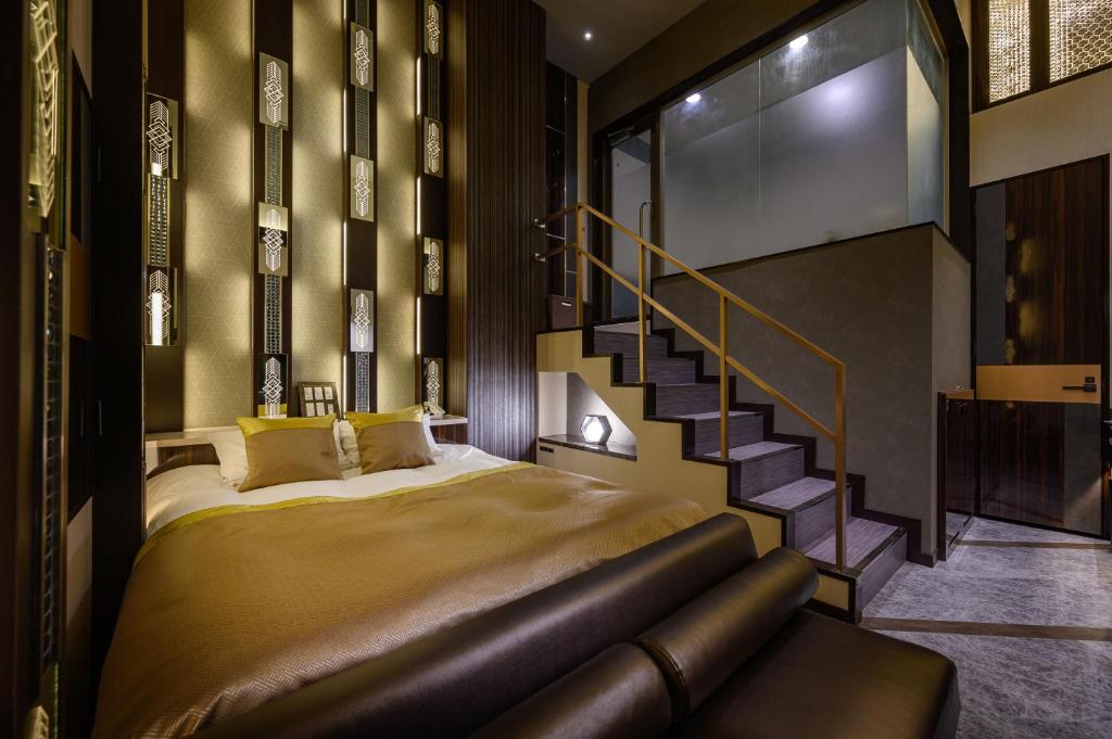 Postel nebo postele na pokoji v ubytování HOTEL VARKIN ANNEX