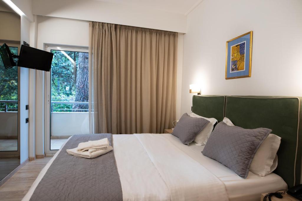 Posteľ alebo postele v izbe v ubytovaní Anastazia Luxury Suites & Spa