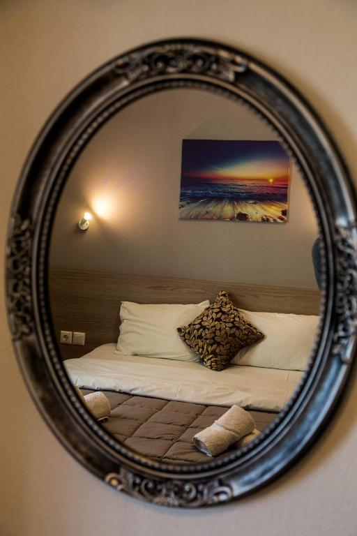 Postel nebo postele na pokoji v ubytování Stalaktites