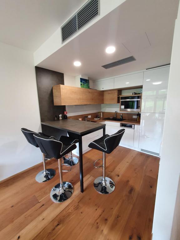 Kuchyň nebo kuchyňský kout v ubytování Green apartmány