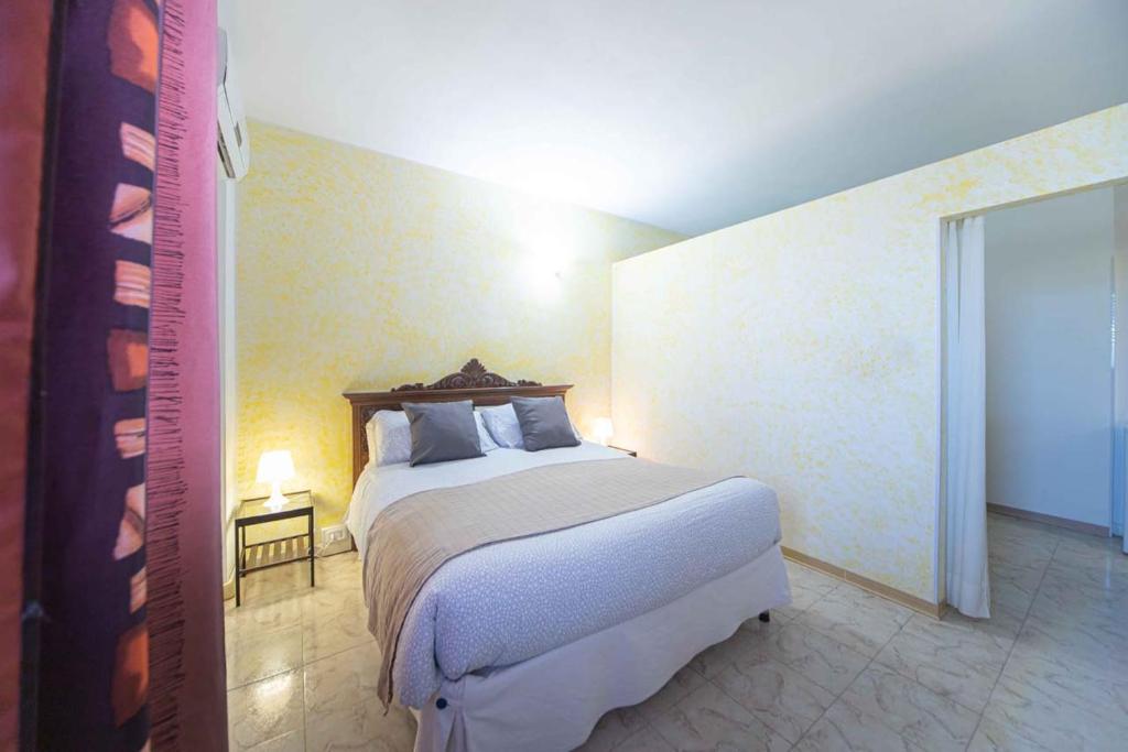 Postel nebo postele na pokoji v ubytování Albergo Luisss