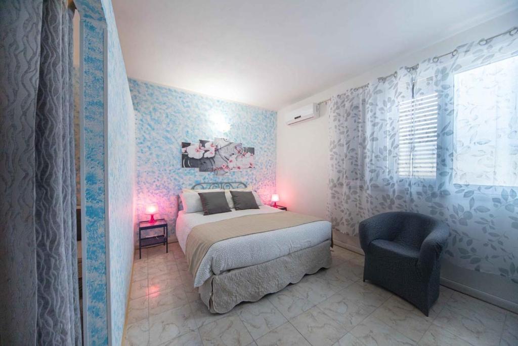 Postel nebo postele na pokoji v ubytování Albergo Luisss