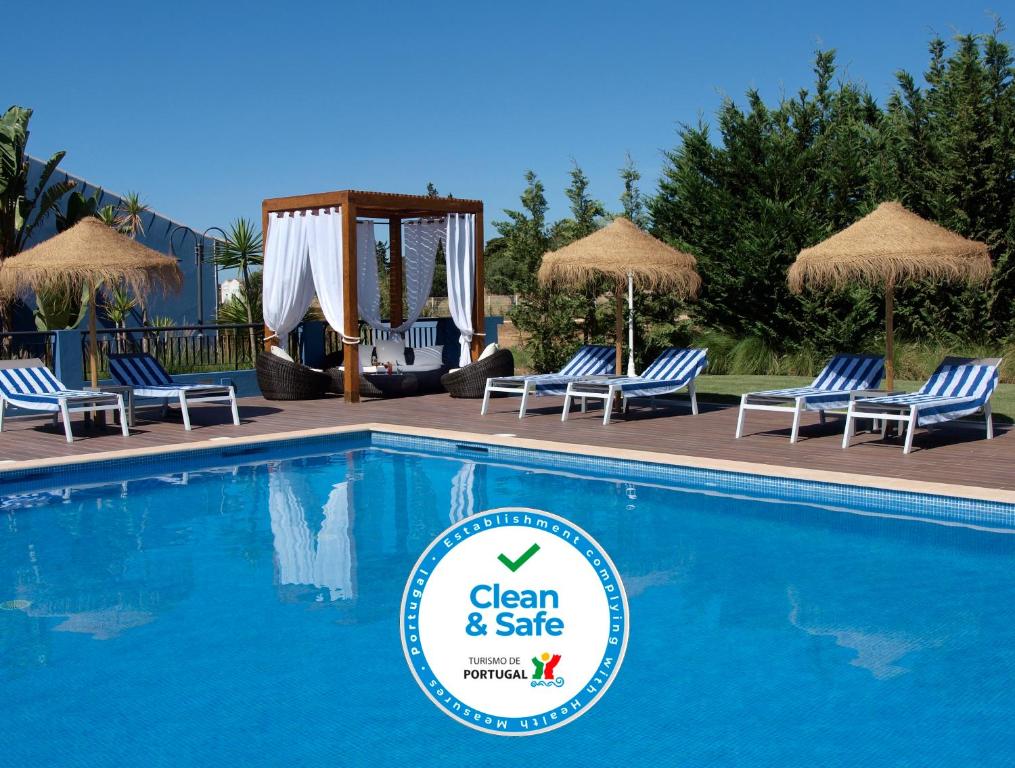 Bazén v ubytování Aldeia Azul Resort nebo v jeho okolí