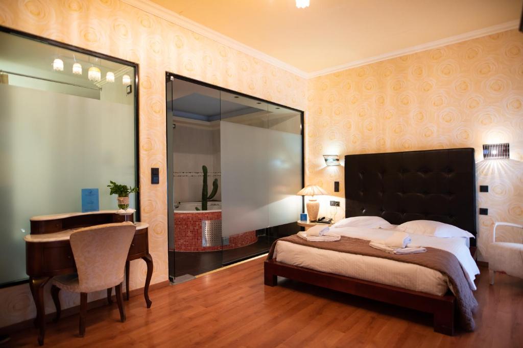 Posteľ alebo postele v izbe v ubytovaní Anastazia Luxury Suites & Spa