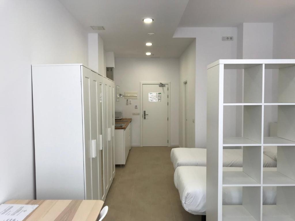 Cama o camas de una habitación en City Suites Marina