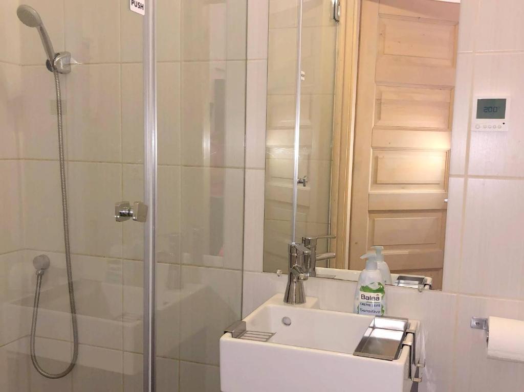 A bathroom at Basilica Suites