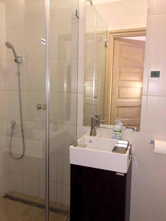 A bathroom at Basilica Suites