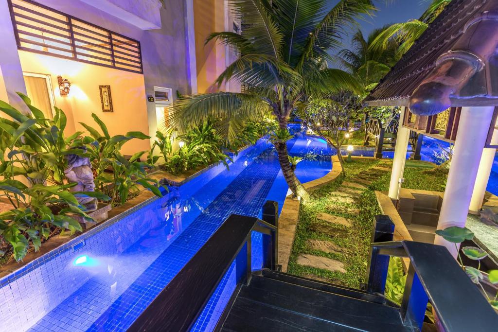 Bazén v ubytování Bali Hotel nebo v jeho okolí