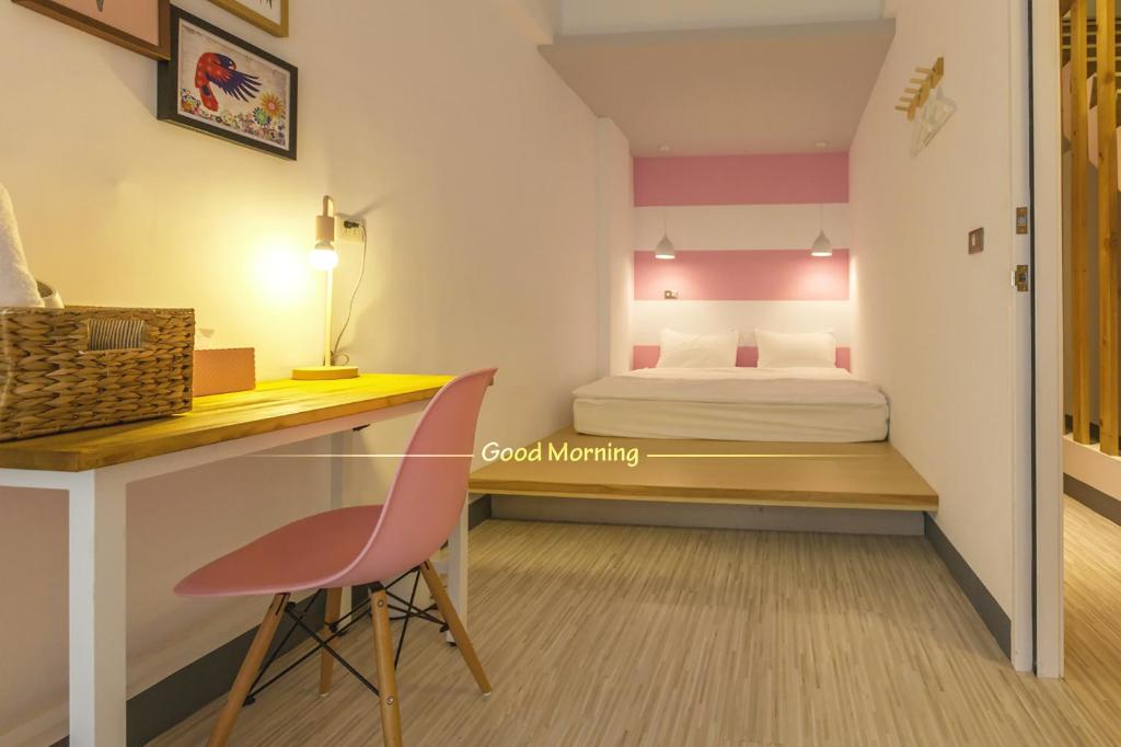 Postel nebo postele na pokoji v ubytování Bayhouse Comfortel Hualien Hostel