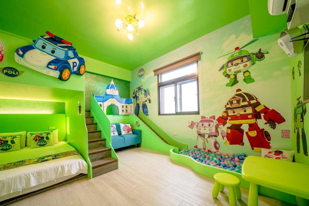 Postel nebo postele na pokoji v ubytování Han Tian B&B