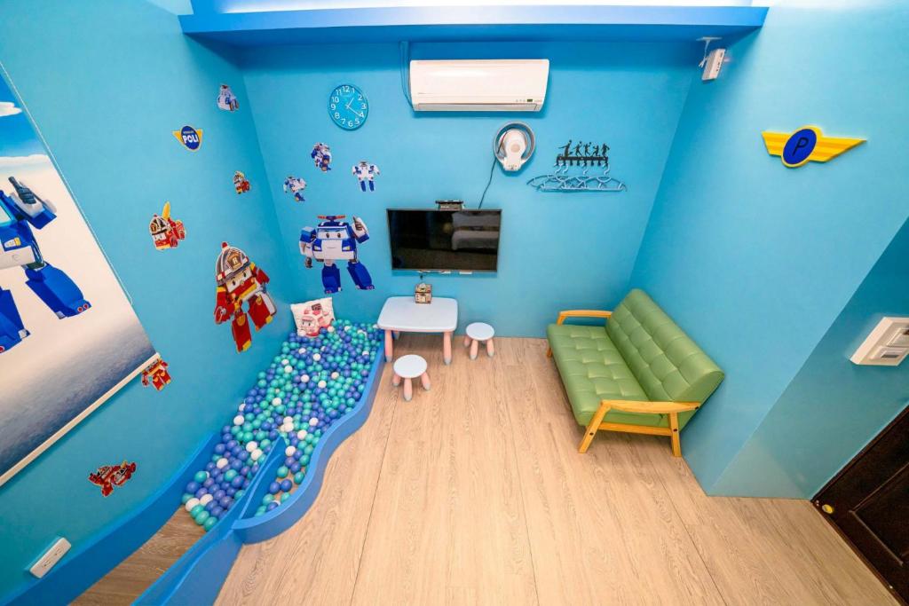 TV a/nebo společenská místnost v ubytování Han Tian B&B