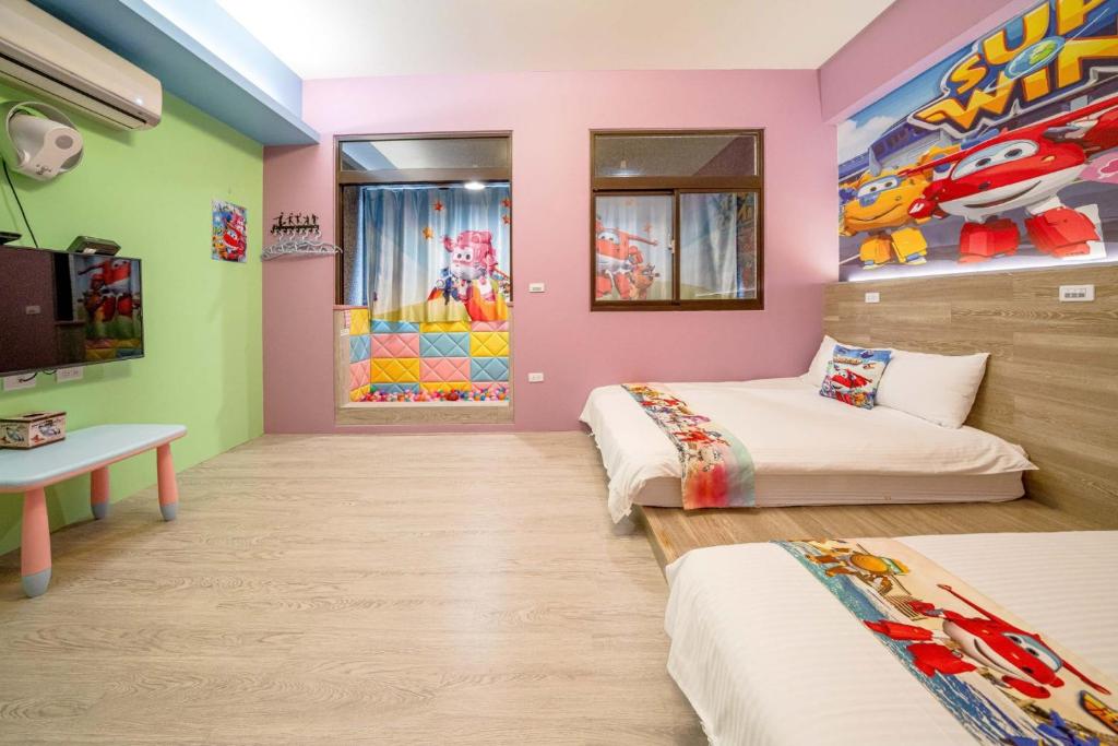 TV a/nebo společenská místnost v ubytování Han Tian B&B