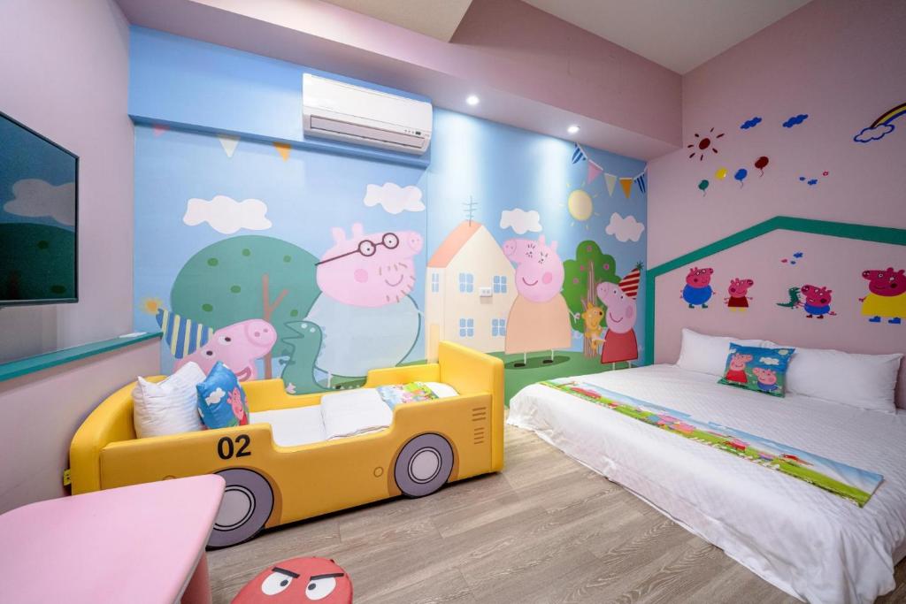 Postel nebo postele na pokoji v ubytování Han Tian B&B