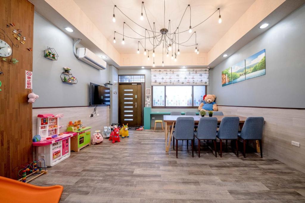 TV a/nebo společenská místnost v ubytování Han Tian B&B