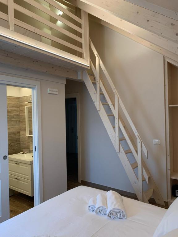 Postel nebo postele na pokoji v ubytování Hotel Rosengarten