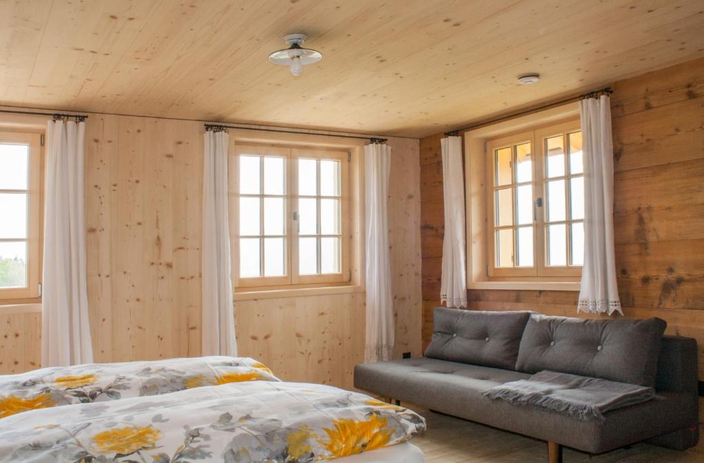 A bed or beds in a room at UNSER VORSÄSS - Geißkopf
