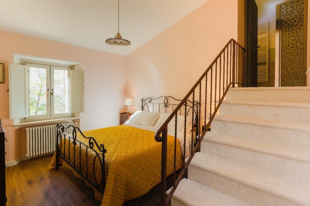 Postel nebo postele na pokoji v ubytování Agriturismo Le Cerque