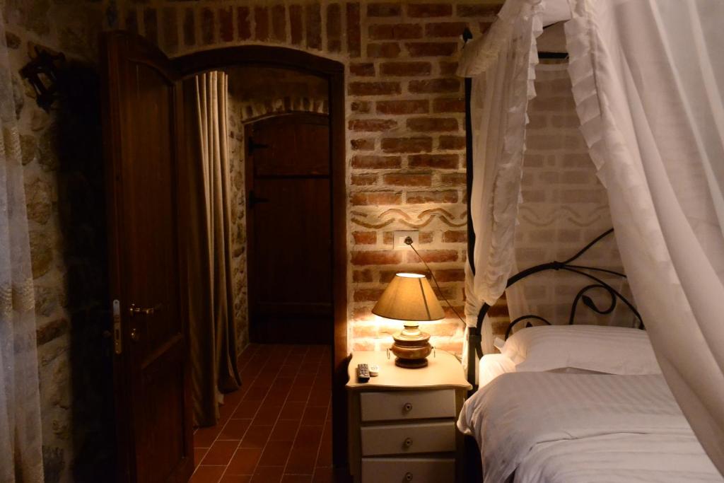 Postel nebo postele na pokoji v ubytování Chateau Fasel