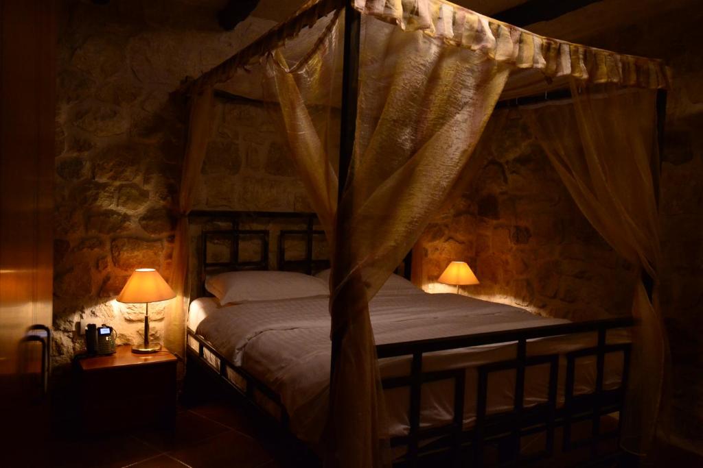 Postel nebo postele na pokoji v ubytování Chateau Fasel