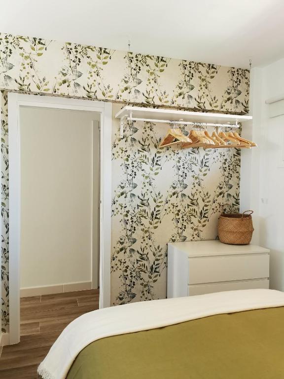 A bed or beds in a room at Lido Beachfront
