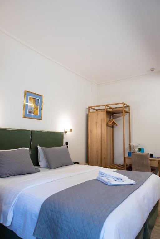 Posteľ alebo postele v izbe v ubytovaní Anastazia Luxury Suites & Spa