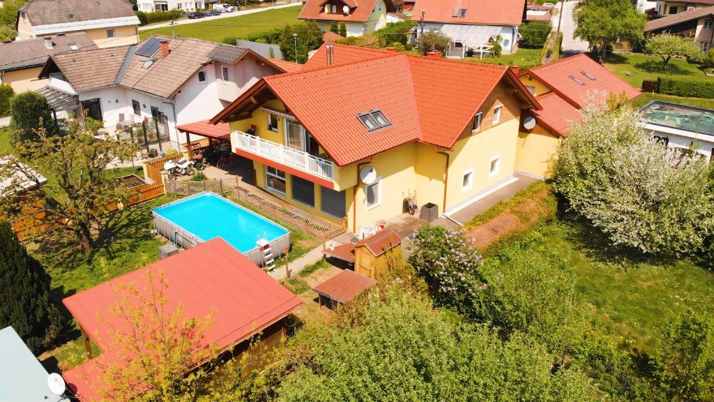 an aerial view of a house with an orange roof at Home Sweet Home in Reichersdorf