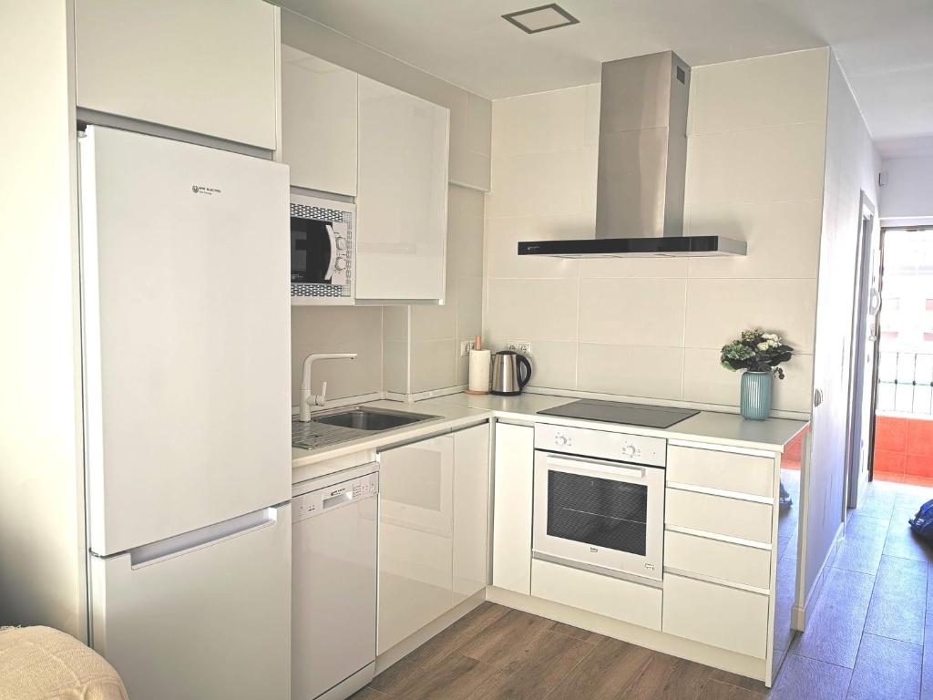 A kitchen or kitchenette at Lido Beachfront