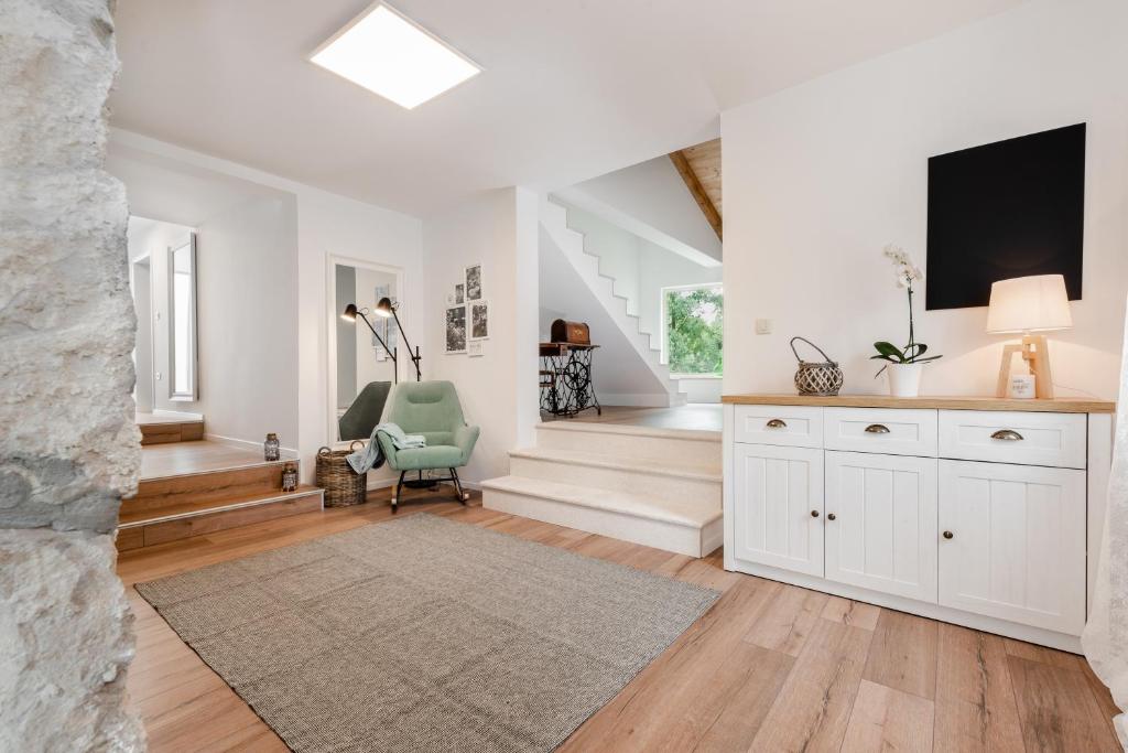 TV a/nebo společenská místnost v ubytování Accommodation TRI MURVE
