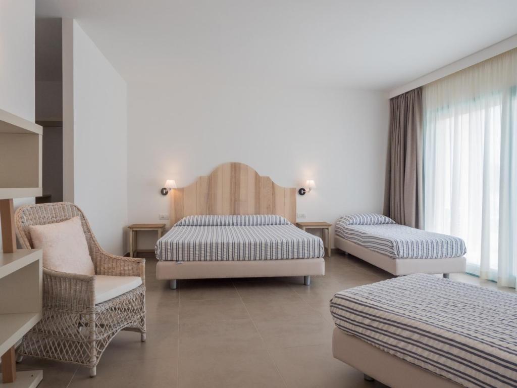 Postel nebo postele na pokoji v ubytování Park Hotel Asinara