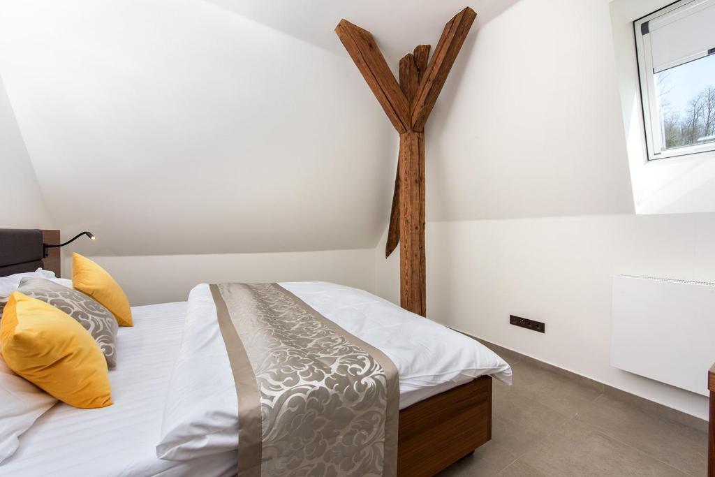 Postel nebo postele na pokoji v ubytování Residence Hluboká