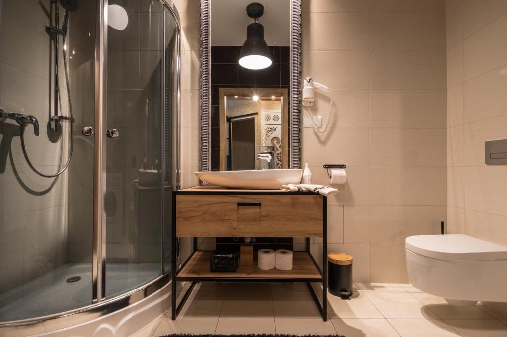 Kúpeľňa v ubytovaní Apartament Karpielówka przy Potoku