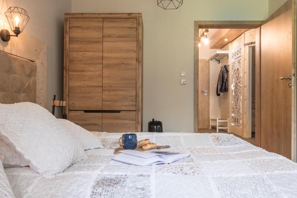 Posteľ alebo postele v izbe v ubytovaní Apartament Karpielówka przy Potoku
