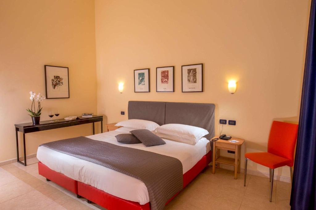Postel nebo postele na pokoji v ubytování Best Western Blu Hotel Roma