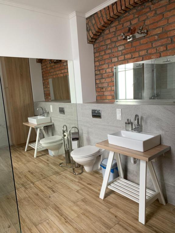 Koupelna v ubytování Prosta 17 Suite by Rentoom