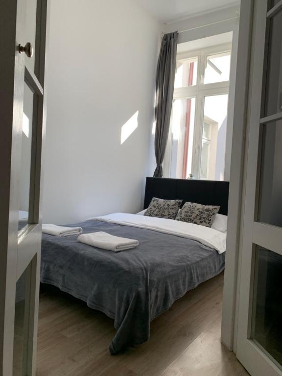 Postel nebo postele na pokoji v ubytování Prosta 17 Suite by Rentoom