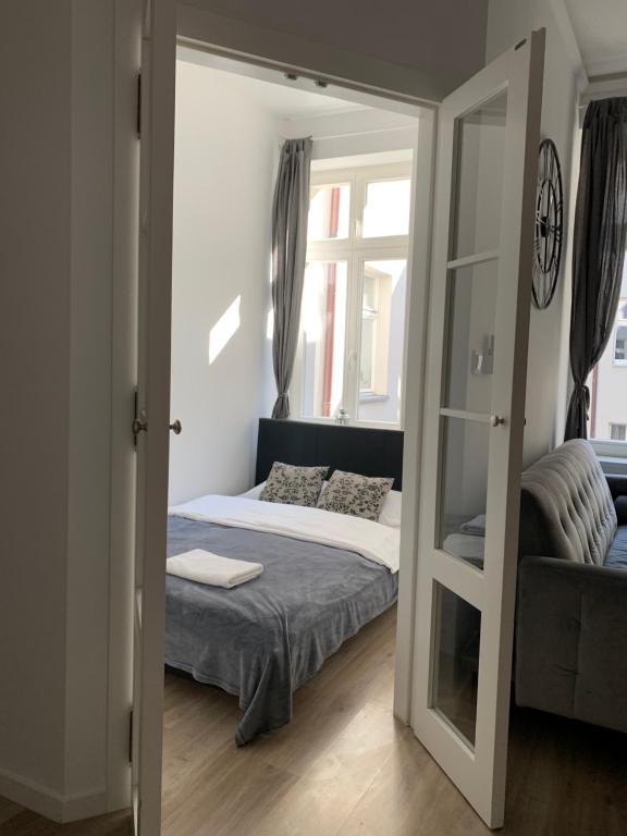 Postel nebo postele na pokoji v ubytování Prosta 17 Suite by Rentoom