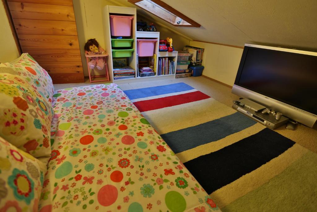 Postel nebo postele na pokoji v ubytování Chalet Mavambo