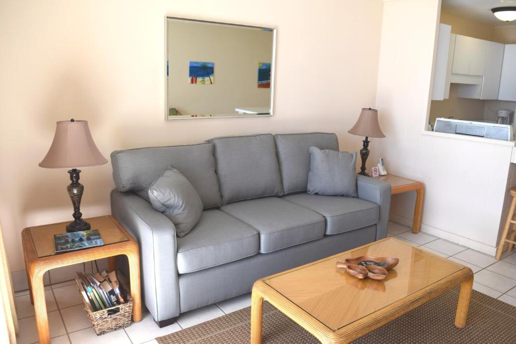 a living room with a couch and a table at Hale Kai O'Kihei 120 in Kihei