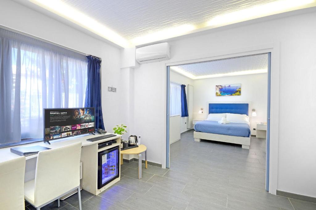 Postel nebo postele na pokoji v ubytování B&B Sorrento Central