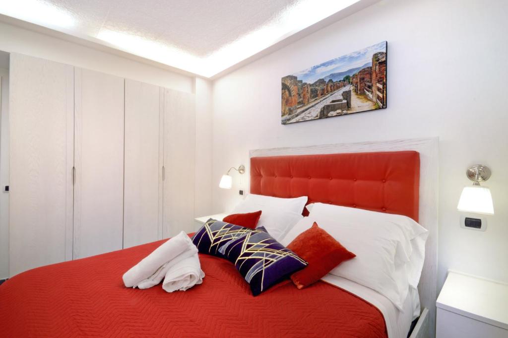 Postel nebo postele na pokoji v ubytování B&B Sorrento Central