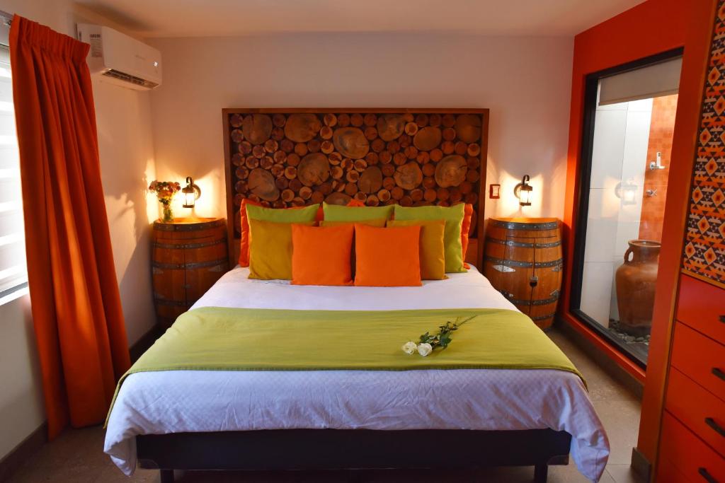 Postel nebo postele na pokoji v ubytování Baja Inn Hoteles Rio